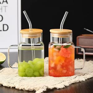 Glass cup with straw