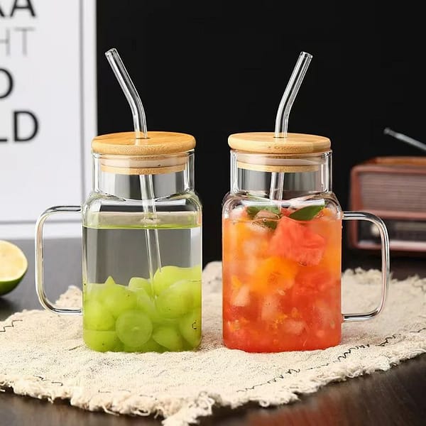 Glass cup with straw